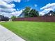Expansive backyard with a lush lawn and privacy fence, perfect for outdoor activities at 3804 Bay Orchard Lane, Loganville, GA 30052