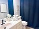 Cozy bathroom featuring a white vanity, updated fixtures, and decorative touches at 3804 Bay Orchard Lane, Loganville, GA 30052