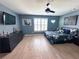 Bedroom featuring light wood floors, ceiling fan, and great decor at 3804 Bay Orchard Lane, Loganville, GA 30052