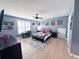 Nicely decorated bedroom with a ceiling fan, themed décor, and wood floors at 3804 Bay Orchard Lane, Loganville, GA 30052