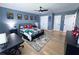 Fun bedroom featuring super hero decor, light wood floors, and a ceiling fan at 3804 Bay Orchard Lane, Loganville, GA 30052