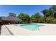 Community swimming pool surrounded by a pool deck, shaded area and landscaping at 3804 Bay Orchard Lane, Loganville, GA 30052