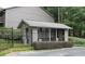 A pool house with gated access and a well-maintained exterior enhancing the community's amenities at 3828 Woodridge Way, Tucker, GA 30084