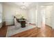 Cozy dining room with elegant decor, hardwood floors, and natural light at 132 Cornerstone Pl, Woodstock, GA 30188