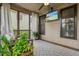 Comfortable screened porch with outdoor seating, ceiling fan and nice television at 132 Cornerstone Pl, Woodstock, GA 30188