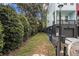 Exterior view of a modern townhouse with a fenced backyard, offering privacy and outdoor space at 2016 Bixby Byway Se Dr, Atlanta, GA 30317