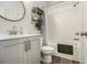 Contemporary bathroom featuring a shower-tub combo, stylish vanity, and modern fixtures at 2016 Bixby Byway Se Dr, Atlanta, GA 30317