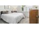 Bright bedroom with neutral colors, window, light colored carpet, and a cozy, inviting atmosphere at 2016 Bixby Byway Se Dr, Atlanta, GA 30317