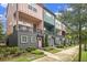 Charming colorful townhomes with private balconies and well-maintained lawns at 2016 Bixby Byway Se Dr, Atlanta, GA 30317
