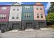 Back of townhomes with garages and modern design create street appeal at 2016 Bixby Byway Se Dr, Atlanta, GA 30317