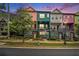 Beautiful colorful townhome exterior with manicured lawn and landscaping at 2016 Bixby Byway Se Dr, Atlanta, GA 30317