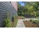 Side view of a building with lush landscaping and mailboxes at 2016 Bixby Byway Se Dr, Atlanta, GA 30317