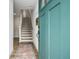 Inviting foyer with hardwood floors leads to a staircase and showcases modern design at 2016 Bixby Byway Se Dr, Atlanta, GA 30317
