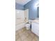 Bathroom featuring a standard white bathtub, toilet, sink and vanity with linoleum flooring at 3396 Misty Harbour Trl, Doraville, GA 30340