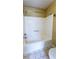 This bathroom has a tub shower combo with white tiling and a standard shower head and faucet at 3396 Misty Harbour Trl, Doraville, GA 30340