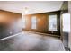 Large bedroom with three windows providing lots of natural light and a ceiling fan at 3396 Misty Harbour Trl, Doraville, GA 30340
