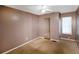 Comfortable bedroom featuring carpeting and a mirrored closet, providing a cozy and practical space at 3396 Misty Harbour Trl, Doraville, GA 30340