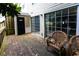 Spacious wooden deck with comfortable wicker chairs, perfect for relaxing and enjoying the outdoors at 3396 Misty Harbour Trl, Doraville, GA 30340