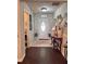 Inviting entryway featuring a front door with decorative glass and stylish decor, creating a welcoming first impression at 791 Bristol Way, Lithonia, GA 30058
