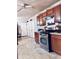 The kitchen shows stainless steel appliances, ample cabinetry, and a view into the laundry room at 791 Bristol Way, Lithonia, GA 30058