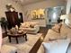 Spacious living room with comfortable seating and stylish decor, creating a cozy and inviting atmosphere at 791 Bristol Way, Lithonia, GA 30058