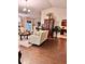 Bright living area with comfortable furniture and a seamless flow to the kitchen and dining space at 791 Bristol Way, Lithonia, GA 30058