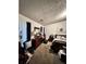 The primary bedroom has cozy carpeting and plenty of natural light, creating a welcoming retreat at 791 Bristol Way, Lithonia, GA 30058