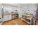 Charming eat-in kitchen offers stainless appliances, wooden island, and ample storage space at 190 Windflower Trce, Roswell, GA 30075
