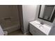 Bathroom showcasing vanity with sink, toilet, and shower/tub, designed for comfort at 3900 Ferncliff Rd, Snellville, GA 30039