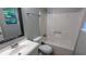 Bathroom featuring a vanity with sink, toilet, and shower/tub combination at 3900 Ferncliff Rd, Snellville, GA 30039