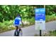 Clear signage along the path pointing to the Piedmont Heights Dining & Retail District at 470 Ansley Walk Ne Ter, Atlanta, GA 30309