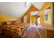 Charming bedroom with a slanted ceiling, double bed, tiled flooring and large dresser at 790 Friendship Church Rd, Douglasville, GA 30134