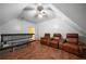 Bonus room equipped with tanning bed and seating, providing a space for relaxation and recreation at 790 Friendship Church Rd, Douglasville, GA 30134