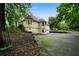 Exterior of home featuring lush landscaping and a winding driveway at 790 Friendship Church Rd, Douglasville, GA 30134