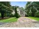 Charming home featuring stone accents, dormer windows, and a unique stone driveway at 790 Friendship Church Rd, Douglasville, GA 30134