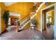Inviting foyer with staircase, tile floor design, and decorative accents offers a warm welcome at 790 Friendship Church Rd, Douglasville, GA 30134