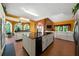 Spacious kitchen featuring an island, stainless steel appliances, and seamless flow to living areas at 790 Friendship Church Rd, Douglasville, GA 30134