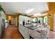 Gourmet kitchen with island, white cabinetry, granite countertops, and stainless steel appliances at 790 Friendship Church Rd, Douglasville, GA 30134