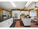 Well-equipped kitchen with ample counter space, custom cabinets, and stainless steel appliances at 790 Friendship Church Rd, Douglasville, GA 30134
