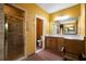 Main bathroom featuring walk-in shower, extended countertop vanity and tiled floor at 790 Friendship Church Rd, Douglasville, GA 30134