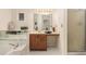 Bathroom with large tub and a vanity with a wood cabinet at 1272 Whitlock Ridge Drive Sw Dr, Marietta, GA 30064