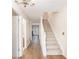 Inviting foyer featuring hardwood floors and staircase at 1272 Whitlock Ridge Drive Sw Dr, Marietta, GA 30064