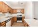 Functional kitchen featuring wood cabinetry and ample counter space at 1272 Whitlock Ridge Drive Sw Dr, Marietta, GA 30064