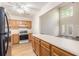 Cozy kitchen with views into the living room, light countertops and wood cabinets at 1272 Whitlock Ridge Drive Sw Dr, Marietta, GA 30064