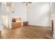 Light filled living room featuring wood floors, fireplace and kitchen access at 1272 Whitlock Ridge Drive Sw Dr, Marietta, GA 30064