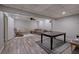 Finished basement showcasing an additional living space with room for a table and seating at 263 Bennett Farms Trl, Acworth, GA 30102