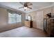 A bedroom with neutral paint, crown molding, and a window with natural light at 263 Bennett Farms Trl, Acworth, GA 30102