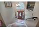 Inviting entryway featuring a high ceiling, tiled floor, front door with sidelights and chandelier at 263 Bennett Farms Trl, Acworth, GA 30102