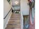 Welcoming entryway with hardwood stairs, neutral walls, and a view to the living room at 263 Bennett Farms Trl, Acworth, GA 30102