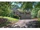 Beautiful two-story home with lush green lawn, two car garage, and charming curb appeal at 263 Bennett Farms Trl, Acworth, GA 30102